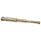 Fully extended 12 inch collapsible brass telescope on a white background
