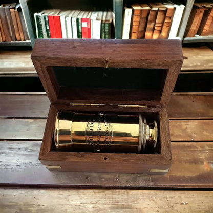 Little golden brass telescope