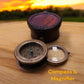 Brass compass with sliding magnifier and leather case