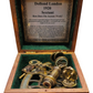 1920 sextant in a wooden box with an informational label