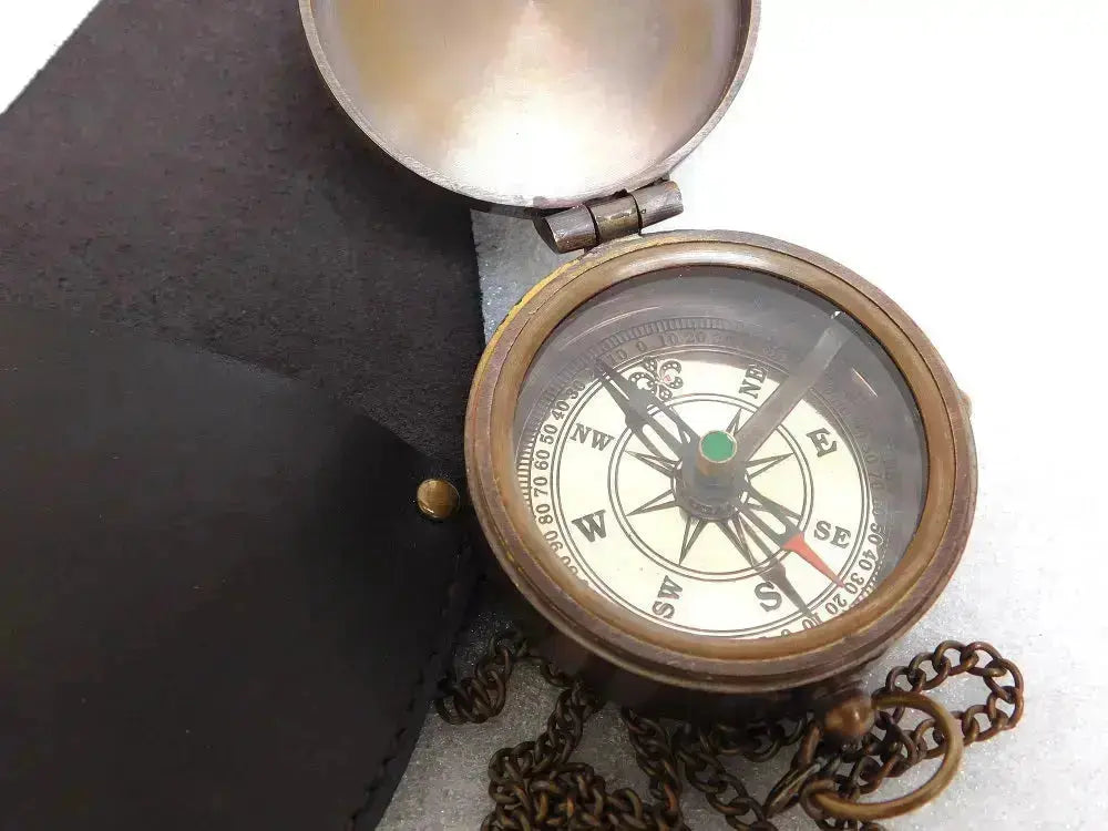 Brass compass with leather case
