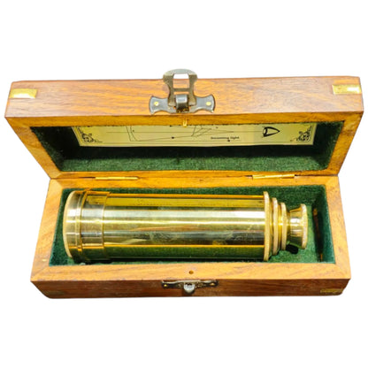 golden brass telescope with vintage wooden box
