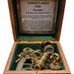 1920 sextant in a wooden box with an informational label