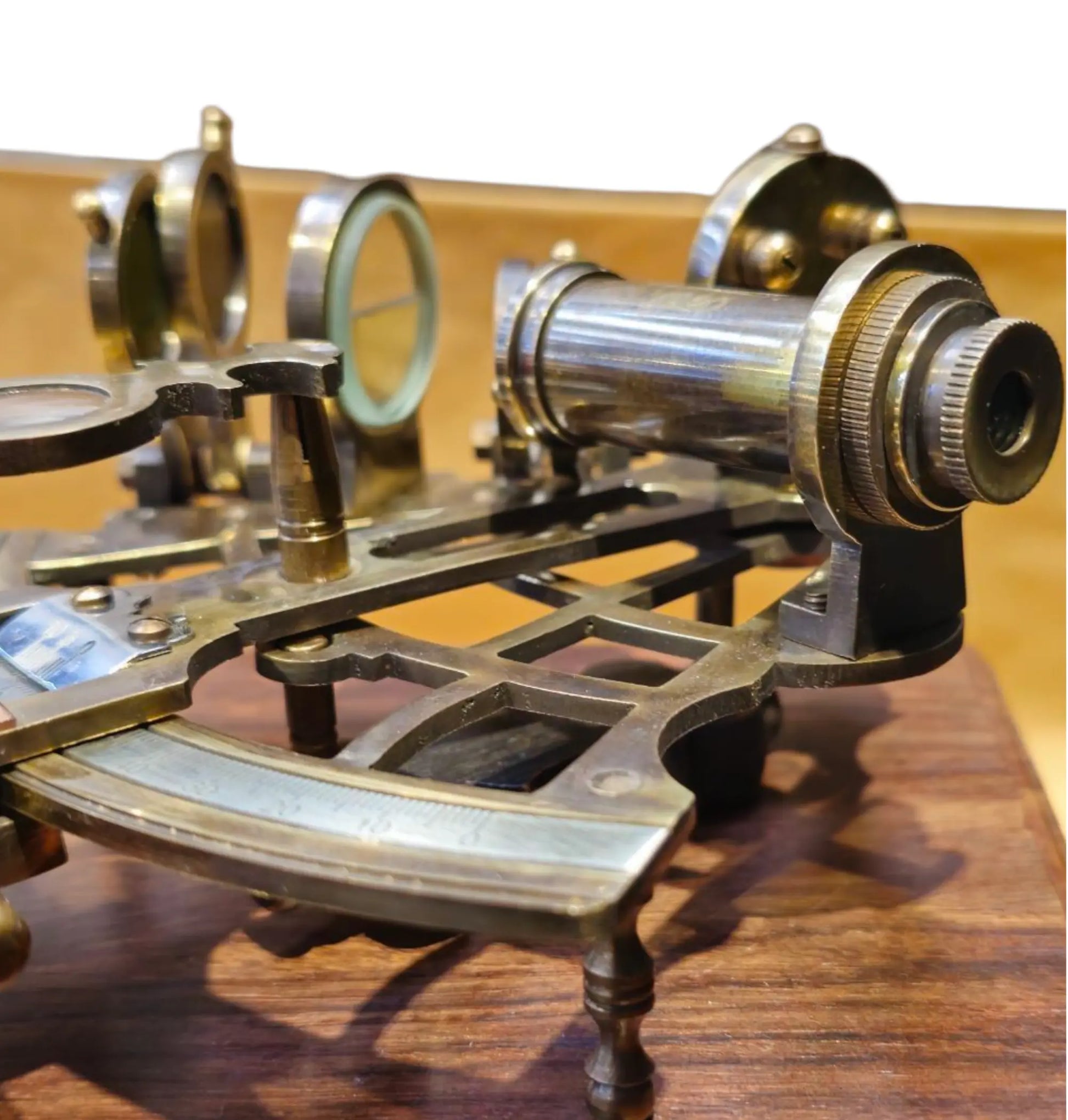 Vintage sextant on a wooden surface