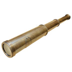 Antique brass telescope fully extended with front lens visible