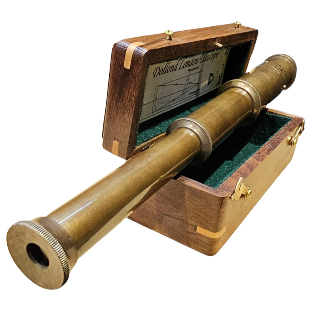 Extended brass telescope showing the eyepiece and wooden presentation box