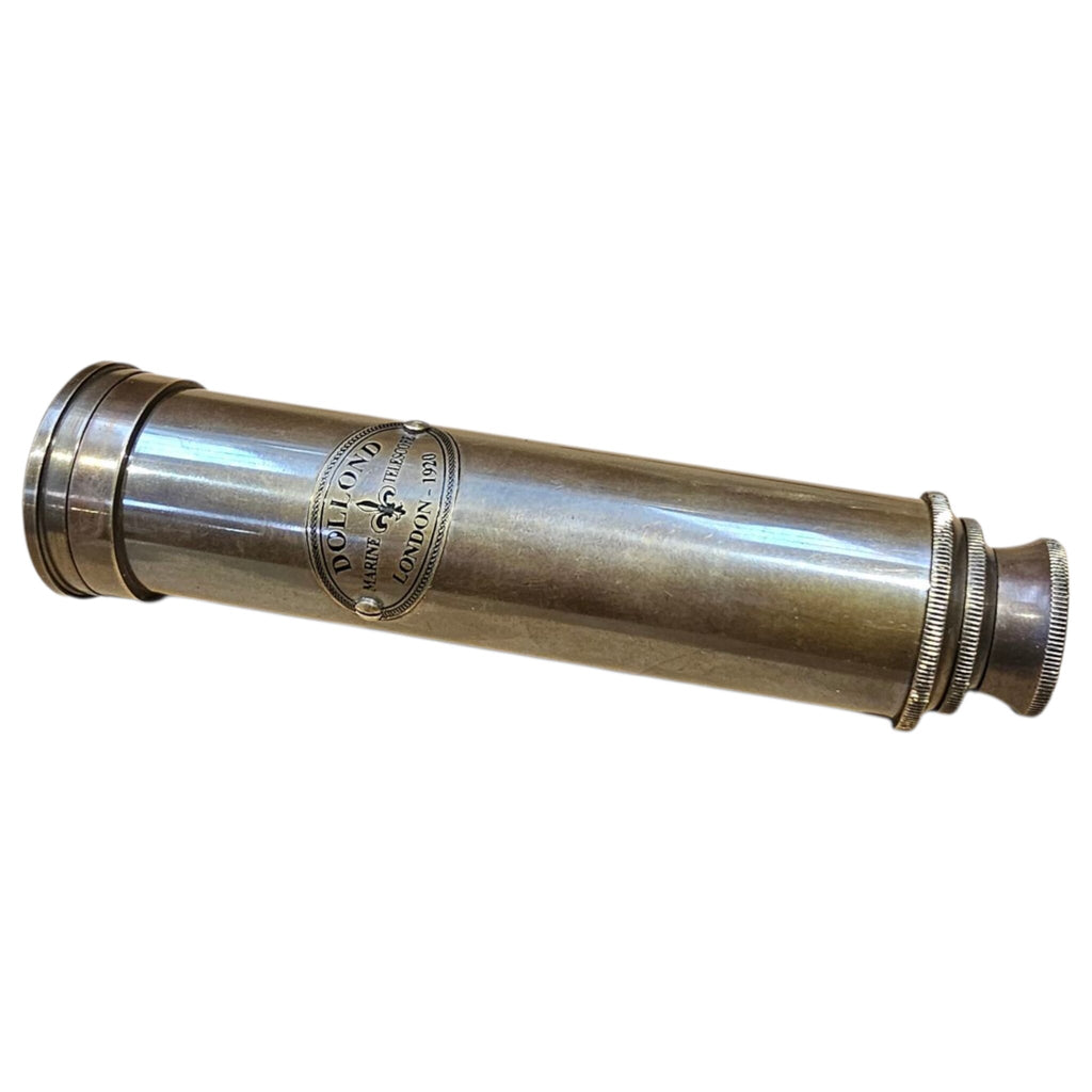 Closed Dollond London brass telescope showing its engraved maker badge