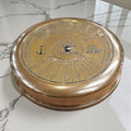 mypirateshop vintage brass perpetual calendar compass with anchor engraving and 100-year date display on marble surface