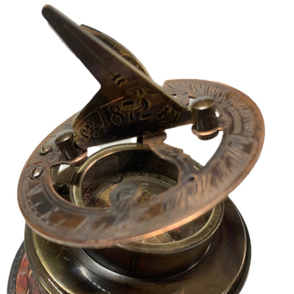 Drum Sundial Compass open to show dual functionality as both a compass and sundial.